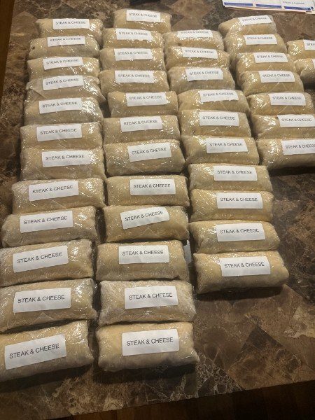 Steak and Cheese egg rolls wrapped and ready to fry