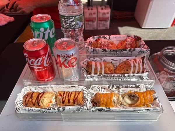 An assortment of Know Your Roll gourmet egg rolls plated and ready to eat